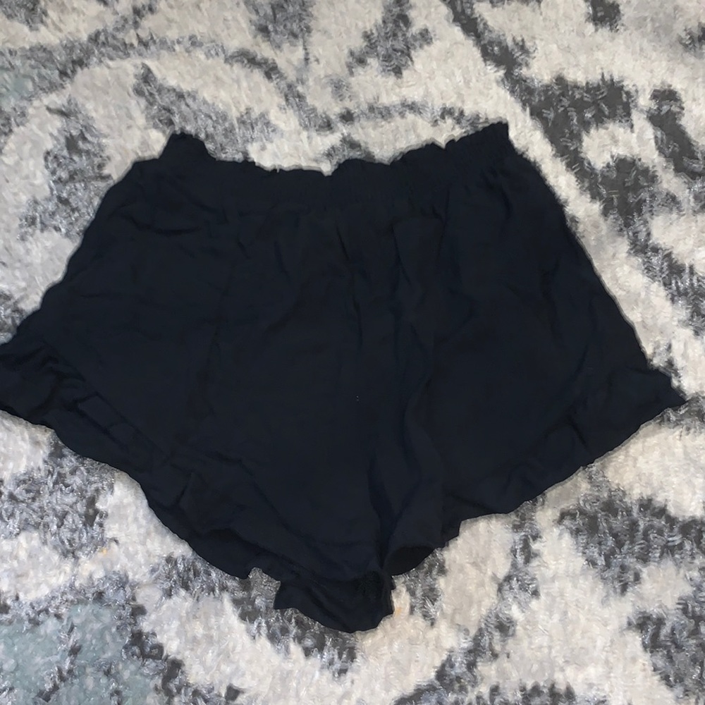 Black shorts that lind of look like a short skirt